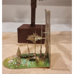 Antique 3 D card, child in garden with golden cage and more, h: 12 cm, l: 12 cm.