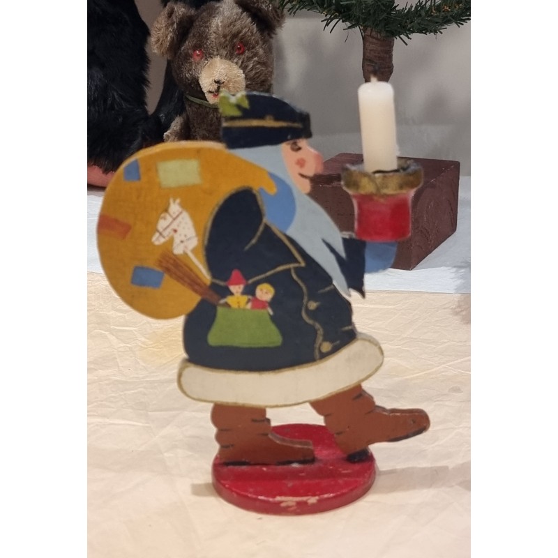 Antique Santa in wood, with sack and candle, 1930, h: 18,5 cm.